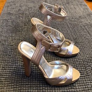 Bebe silver heels with buckle. Size 8.